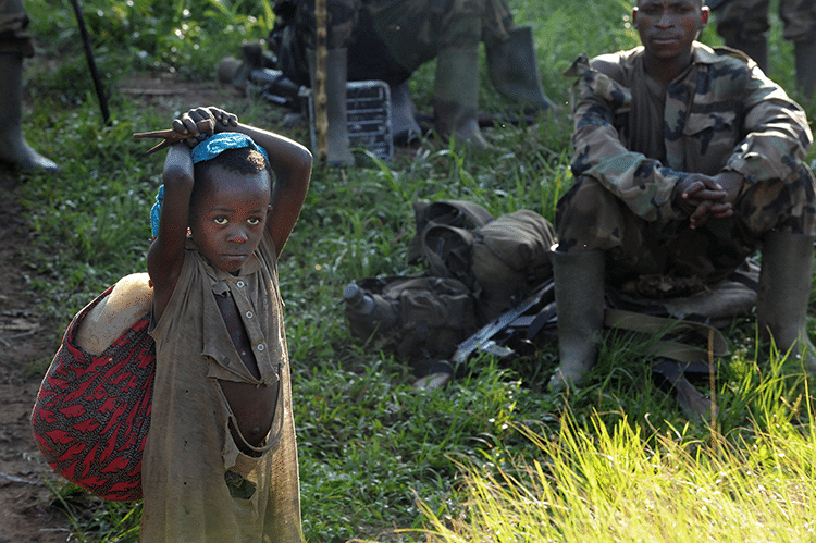 Villagers from Brazza approach Langira as they flee FDLR atrocities