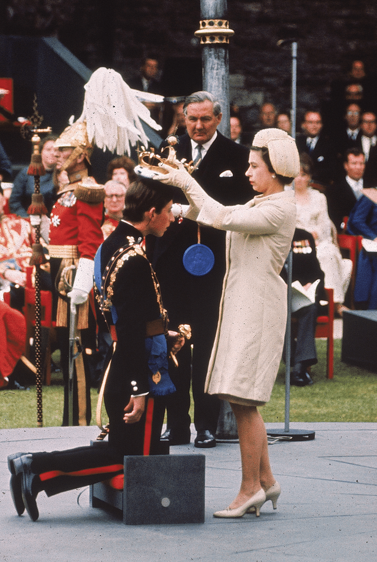 Queen Elizbeth II crowns her son, Prince Charles, as Prince of Wales during the investiture ceremony at  Caernarfon castle, 1st July 1969. Photo: PA/PA Archive/Press Association Images
