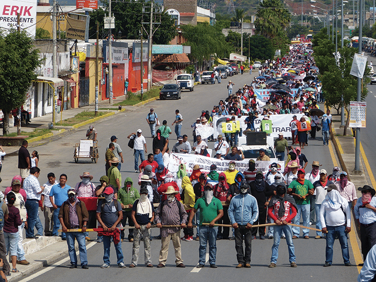 Members of a dissident left-wing teachers union demonstrate in Iguala in support of the Ayotzinapa movement, October 2014. Photo: Témoris Grecko