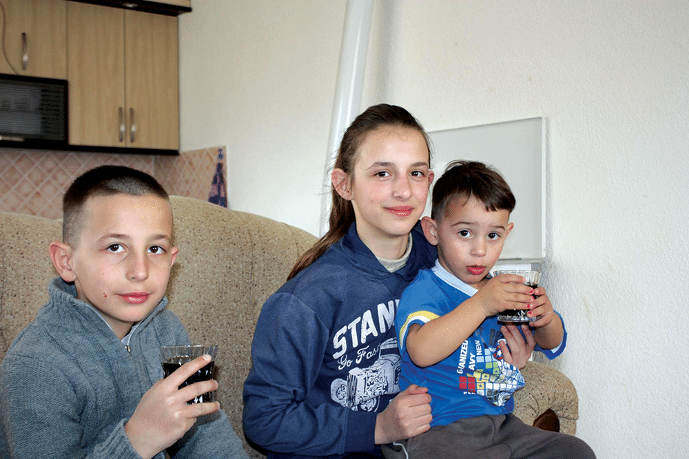 Altina and her brothers. Photo: Mitra Nazar
