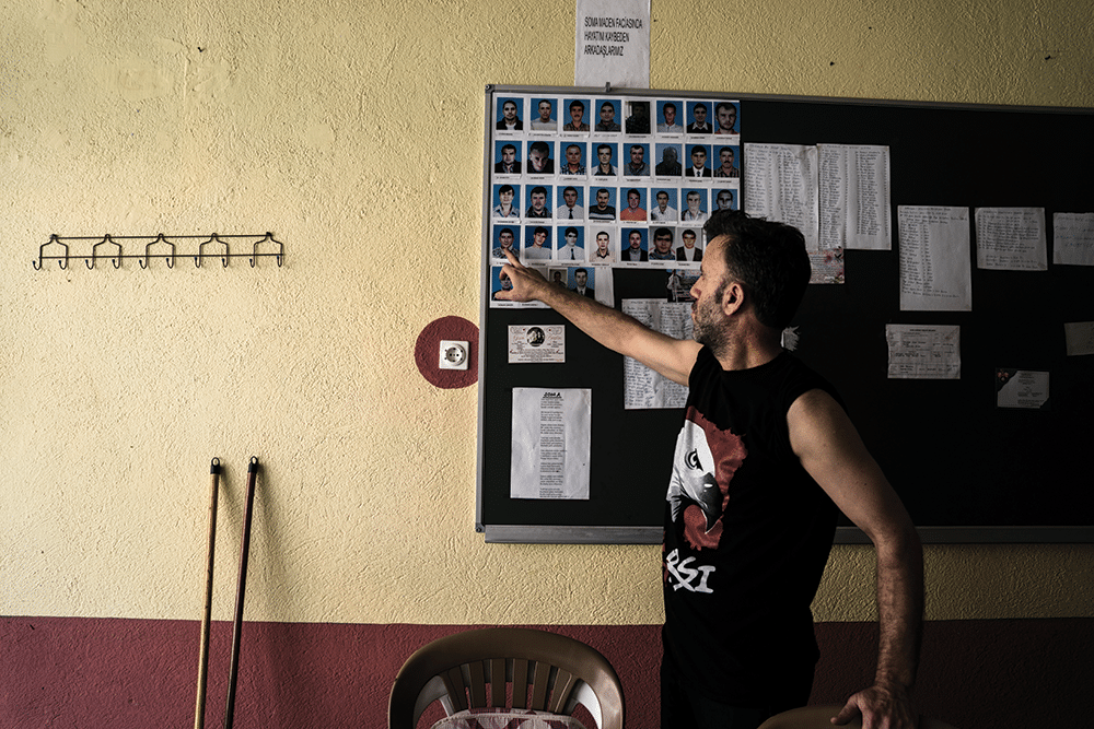 Former mine worker Musa Çakmak points to the 34 miners from the town of Savastepe who were killed at Soma. Photo: Guy Martin