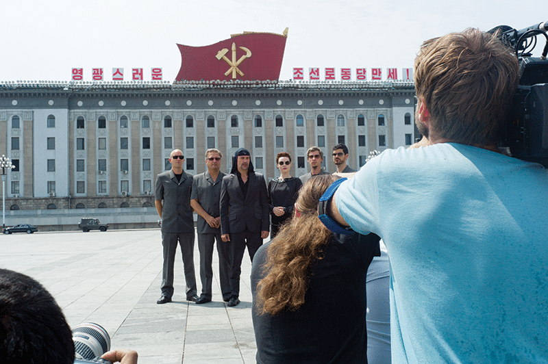 Members of Laibach pose in a square in central Pyongyang. Photo: Daniel Miller