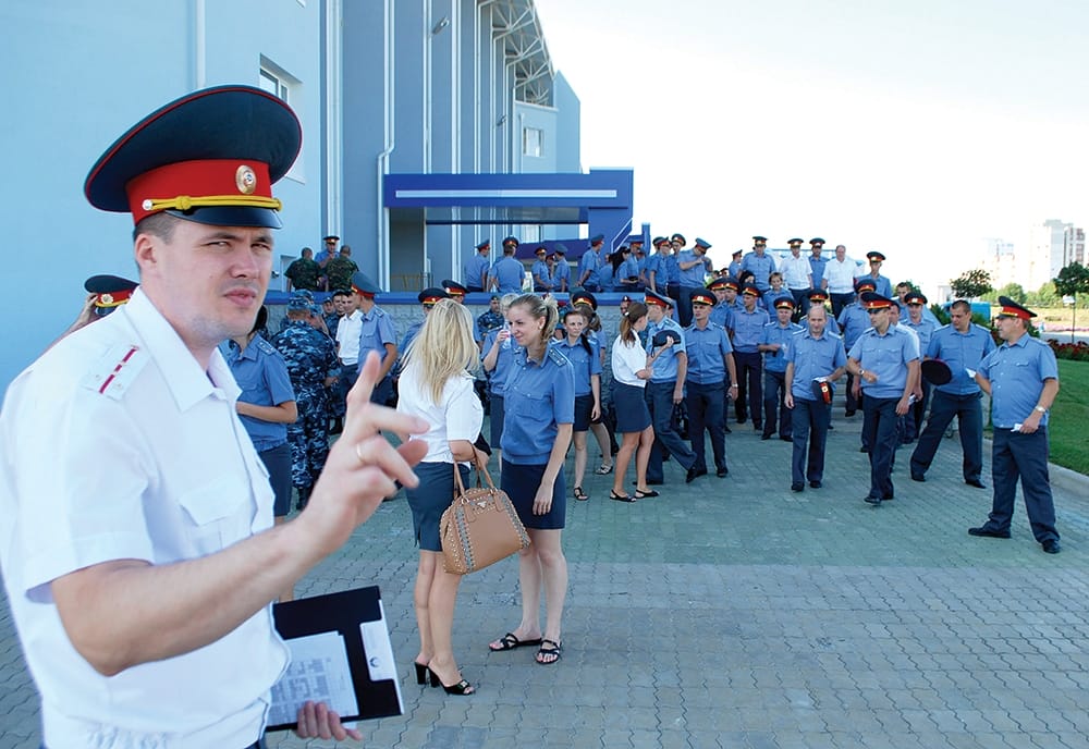 A Transnistrian police officer is sceptical about photography