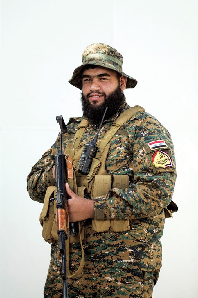 Ashraf Hassan from the Ali al-Akbar Brigade, who fought  alongside pro-government Sunni tribes south of Mosul