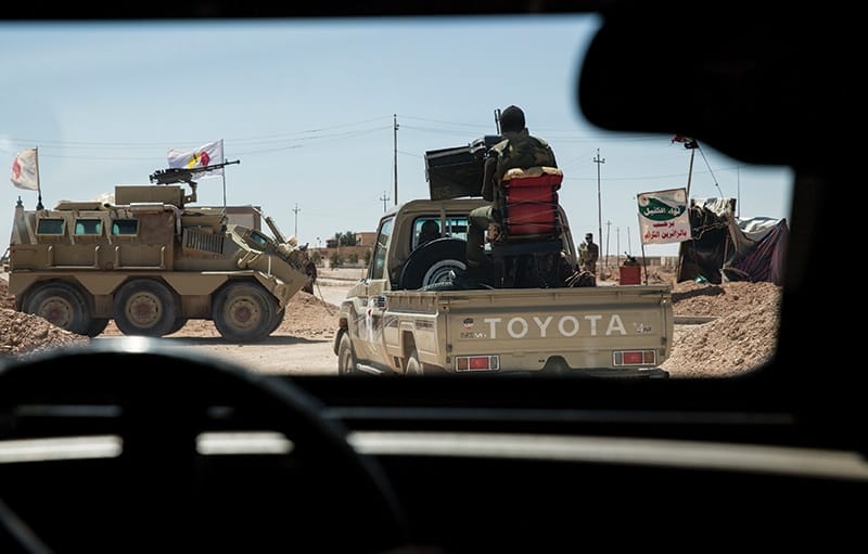 The Hashd al-Shaabi’s equipment comes from all over the world. The 6x6 military vehicle guarding this checkpoint is a French-made Panhard VCR armoured personnel carrier