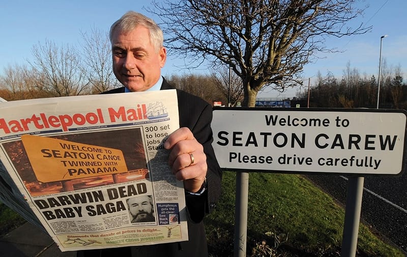 A Seaton Carew businessman catches up with local news, December 2007. Photo: John Giles/PA Wire