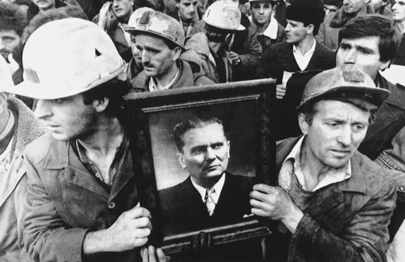 Miners carry a portrait of the late Marshal Tito in demonstrations in Priština, November 1988. Photo: AP / PA Images