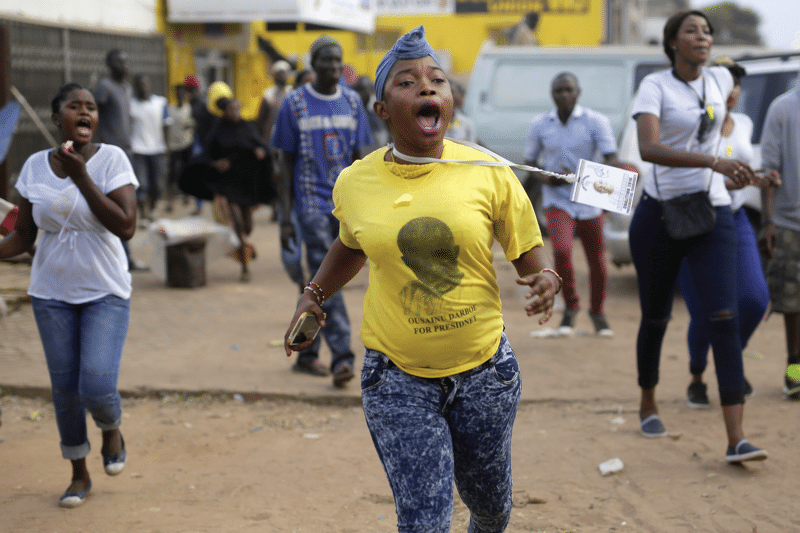 A UDP supporter wears a campaign T-shirt for the former leader Ousainou Darboe, who was imprisoned in July 2016. Photo: Jerome Delay / AP / PA Images