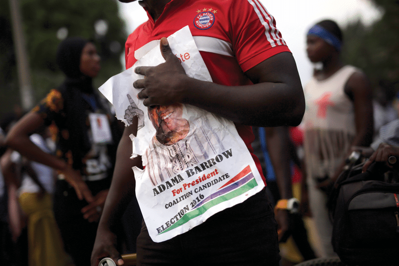 An opposition supporter in the Talinding district of Banjul, three days before the election.  Photo: Jerome Delay / AP / PA Images