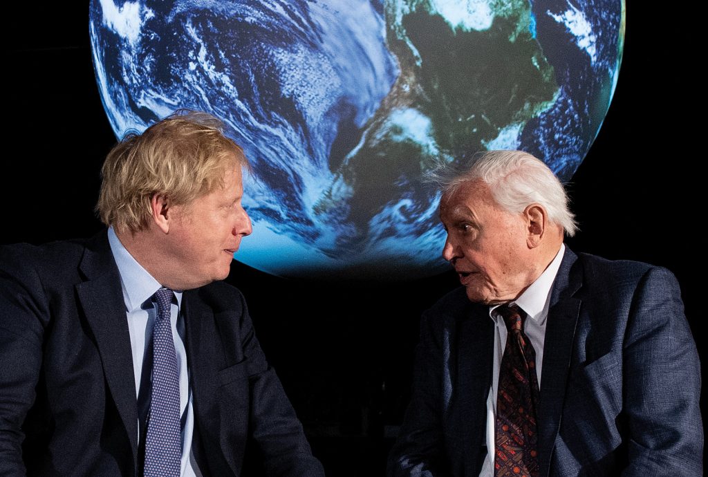 UK prime minister Boris Johnson talks with veteran broadcaster and conservationist Sir David Attenborough at a London launch event for Cop26 on 4th February 2020