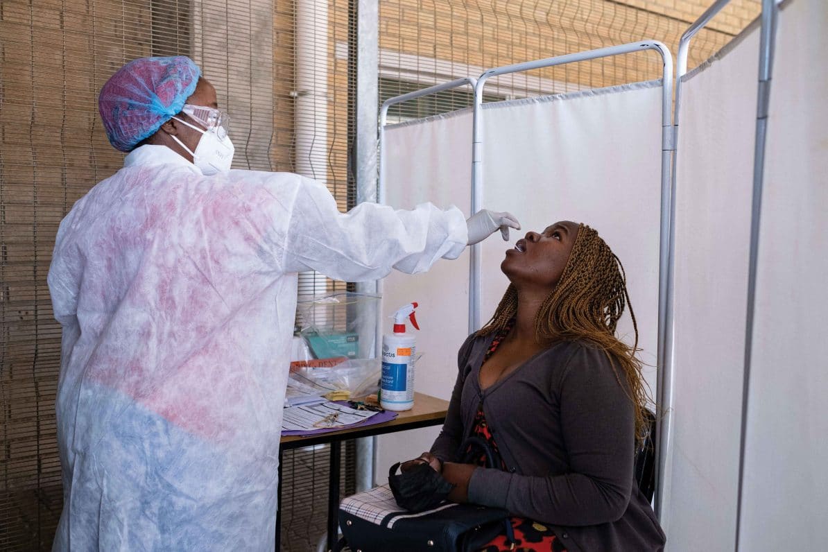 A healthcare worker conducts a PCR Covid-19 test at the Lancet laboratory in Johannesburg. 30th November 2021