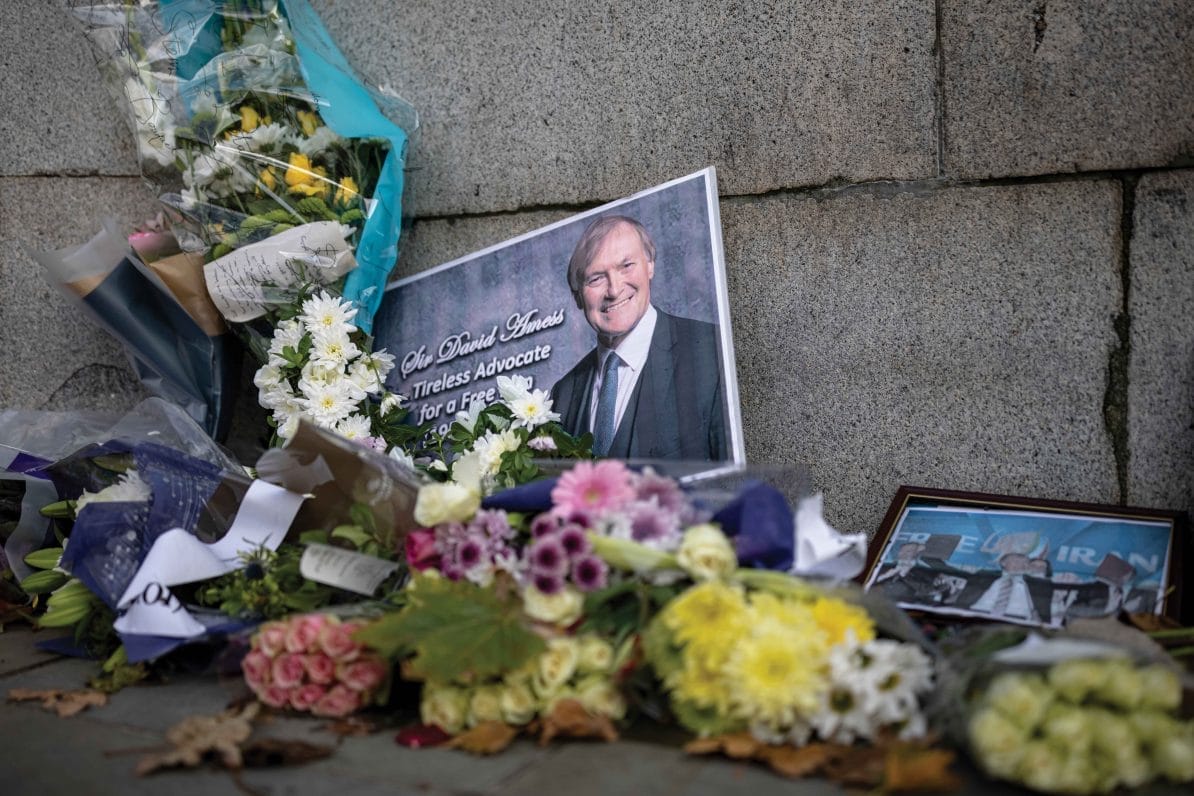 A floral tribute to murdered MP Sir David Amess is left outside parliament in London, 19th October 2021