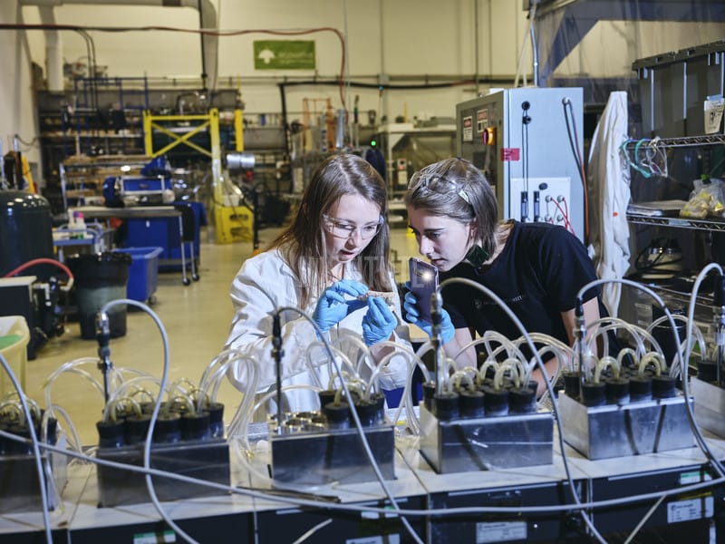  Ecovative Design researchers Hazel Robertson and Jenifer Morgan-Davie check the growth status of fungus-based materials test samples in the biomaterials company’s headquarters in Green Island, New York 