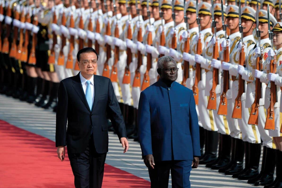 Solomon Islands prime minister Manasseh Sogavare (right) and Chinese premier Li Keqiang inspect honour guards during a welcome ceremony at the Great Hall of the People in Beijing, 2019