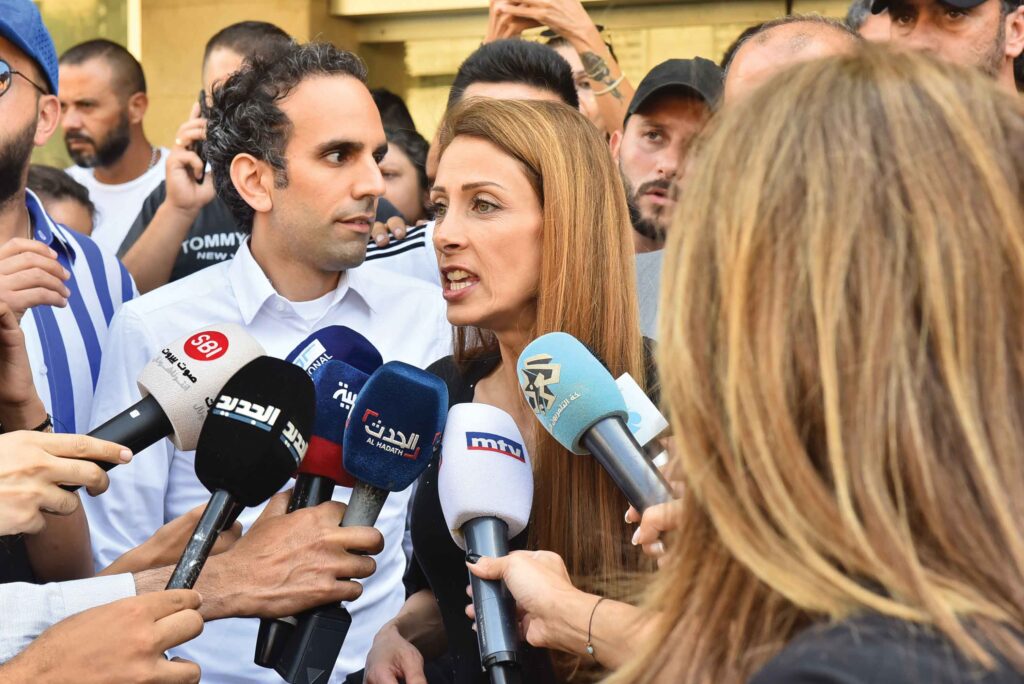 Lebanese MP Cynthia Zarazir speaks to journalists after raiding a bank to get hold of her own money to pay for medical bills, 5th October 2022