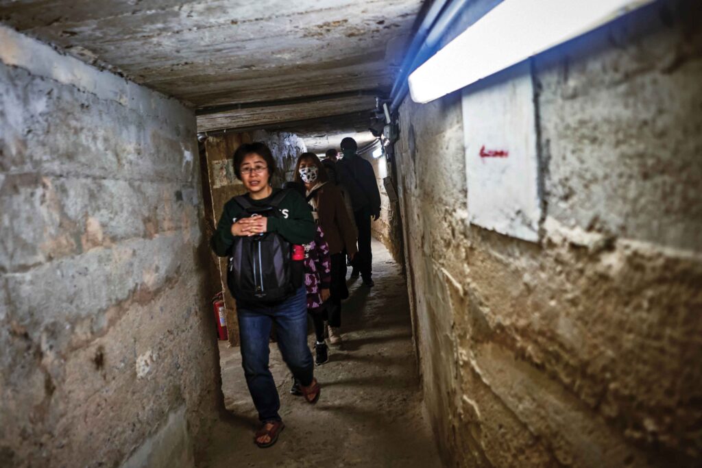  Tourists visit the tunnels beneath the Shaxi Fort in Lieyu, Kinmen 
